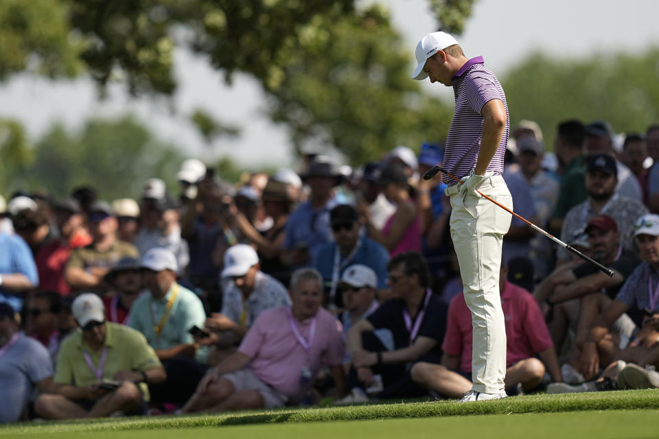 Jordan Spieth reacts to his shot on the 18th hole during the first round of the PGA Championship golf tournament, Thursday, May 19, 2022, in Tulsa, Okla. (AP Photo/Eric Gay)