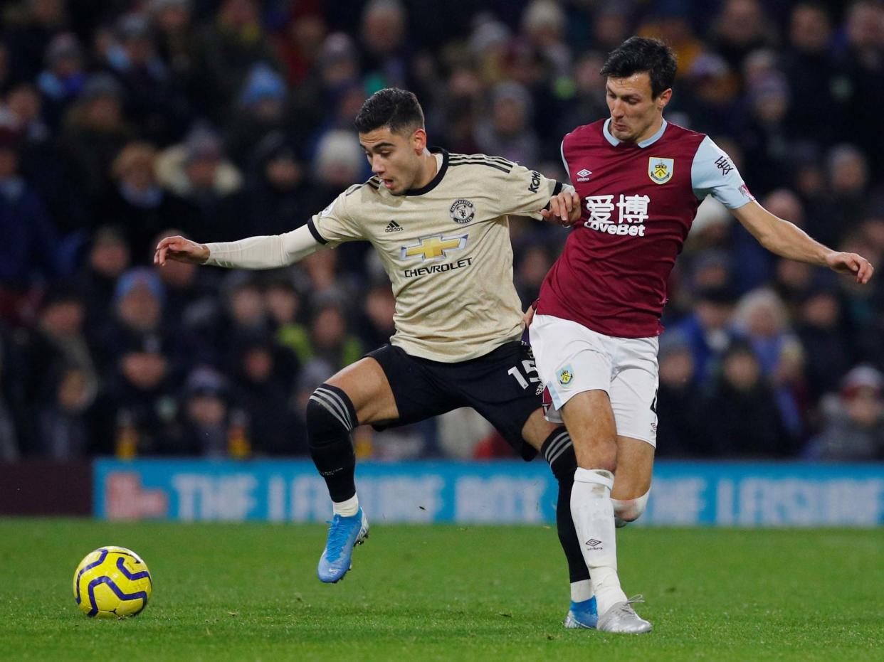 Manchester United's Andreas Pereira in action with Burnley's Jack Cork: REUTERS