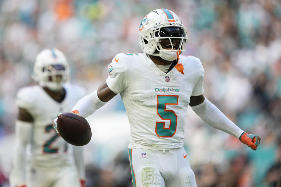 Miami Dolphins cornerback Jalen Ramsey (5) celebrates after intercepting a pass thrown by Las Vegas Raiders quarterback Aidan O'Connell during the second half of an NFL football game, Sunday, Nov. 19, 2023, in Miami Gardens, Fla. (AP Photo/Rebecca Blackwell)