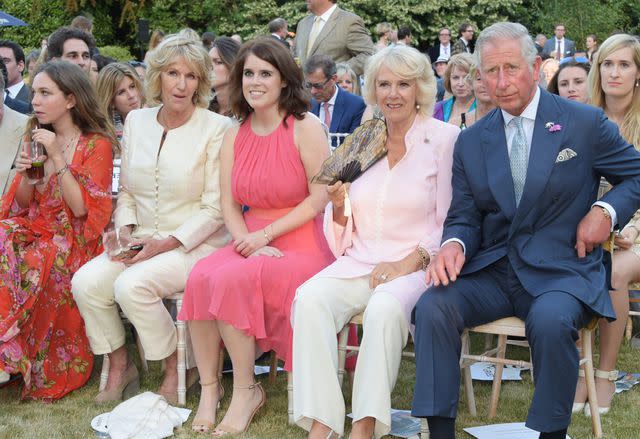 David M. Benett/Dave Benett/Getty Ayesha Shand, Annabel Elliot, Princess Eugenie, Queen Camilla and King Charles attend the Quintessentially Foundation and Elephant Family's Royal Rickshaw Auction presented by Selfridges at Lancaster House on June 30, 2015 in London.