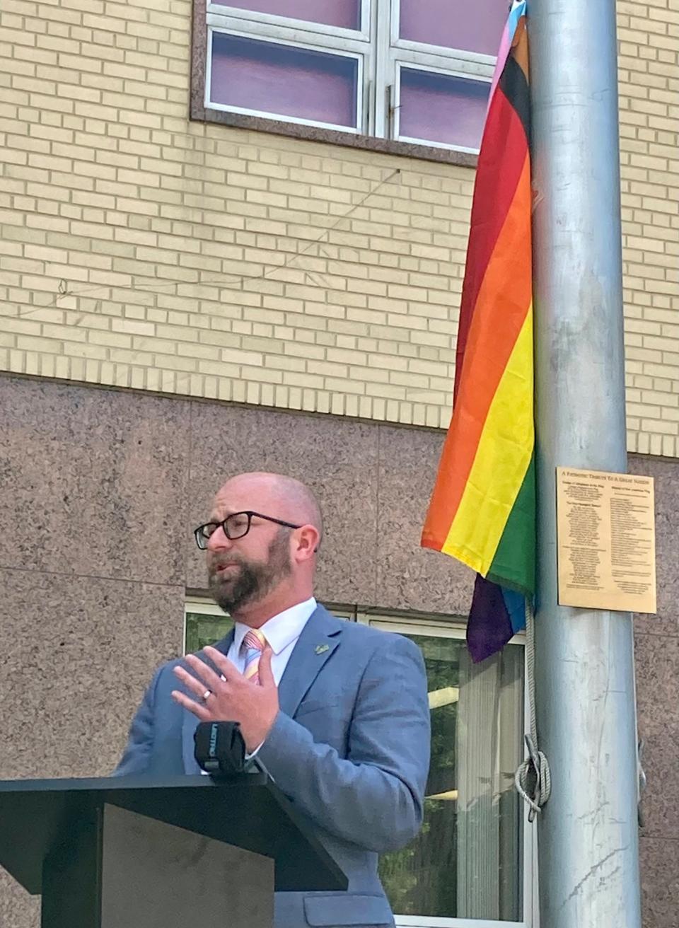 Green Bay Mayor Eric Genrich speaks before raising a flag for Pride Month outside City Hall on Tuesday, June 7, 2022.