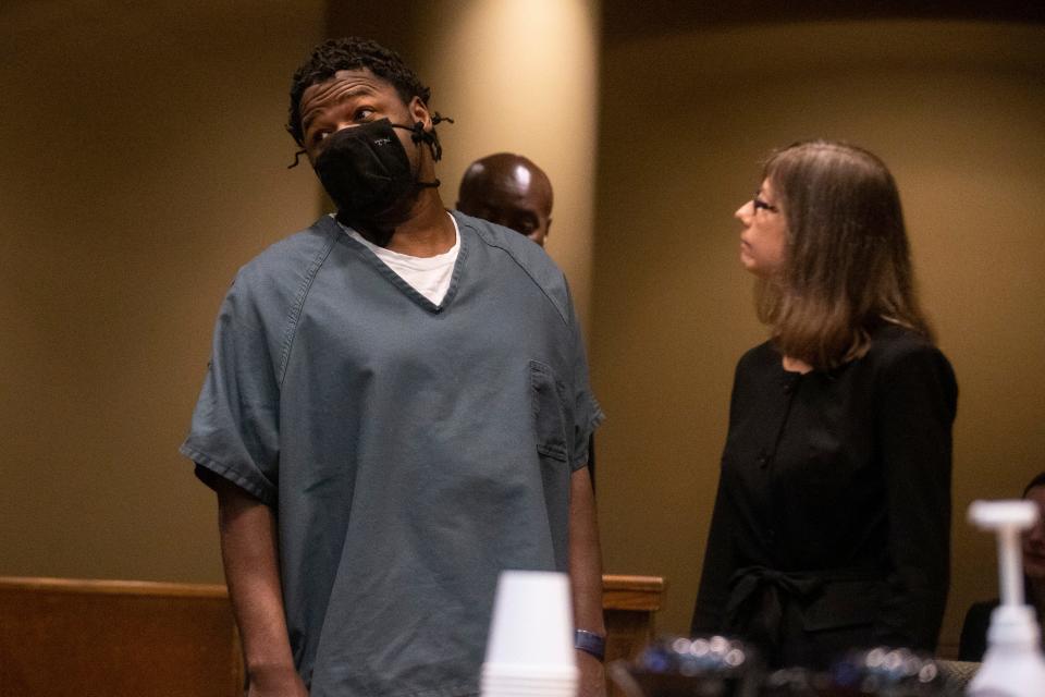 Cleotha Abston-Henderson, the man charged with the abduction and killing of Eliza Fletcher, looks up at Shelby County Criminal Court Judge Lee V. Coffee while standing next to his lawyer Jennifer Case during a court appearance in which Shelby County District Attorney Steve Mulroy announced that his office would seek the death penalty in the case against Abston-Henderson in Memphis, Tenn., on Thursday, July 6, 2023. 