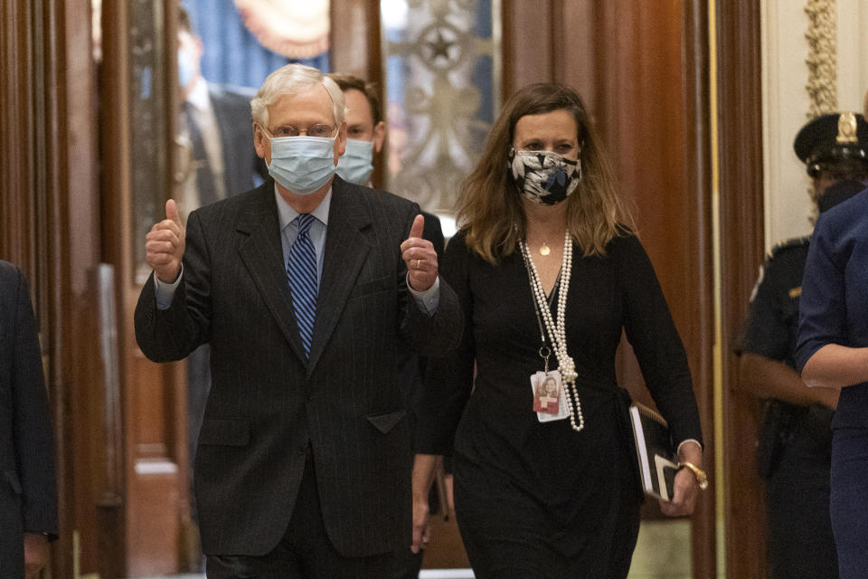 Senate Majority Leader Mitch McConnell of Ky., reacts as he leaves the chamber at the Capitol after a vote confirming Amy Coney Barrett to the Supreme Court, Monday, Oct. 26, 2020, in Washington. (AP Photo/Manuel Balce Ceneta)