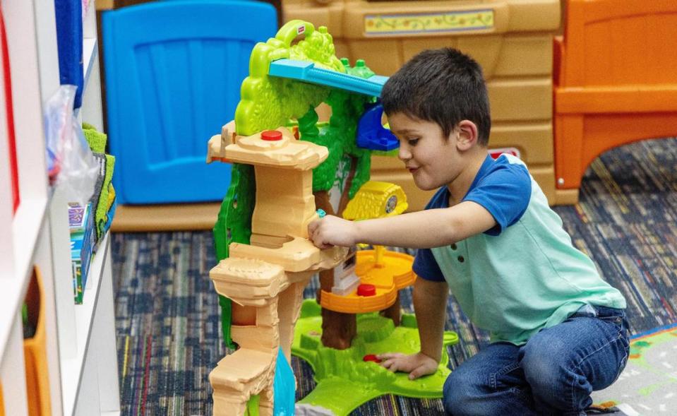 A pre-K student plays at God’s Creation child care center. The center has struggled to make ends meet without government grants, Rhoan said.