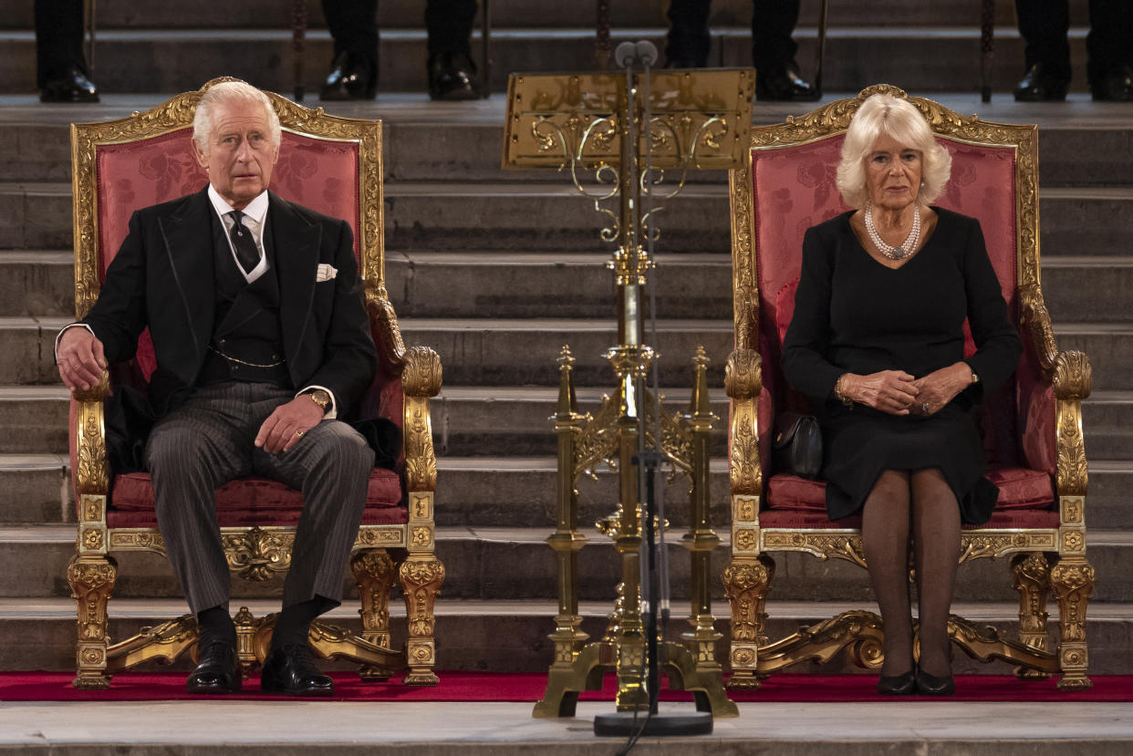 LONDON, ENGLAND - SEPTEMBER 12: King Charles III and Camilla, Queen Consort take part in an address in Westminster Hall on September 12, 2022 in London, England. The Lord Speaker and the Speaker of the House of Commons presented an Address to His Majesty on behalf of their respective House in Westminster Hall following the death of Her Majesty Queen Elizabeth II. The King replied to the Addresses. Queen Elizabeth II died at Balmoral Castle in Scotland on September 8, 2022, and is succeeded by her eldest son, King Charles III.  (Photo by Dan Kitwood/Getty Images)