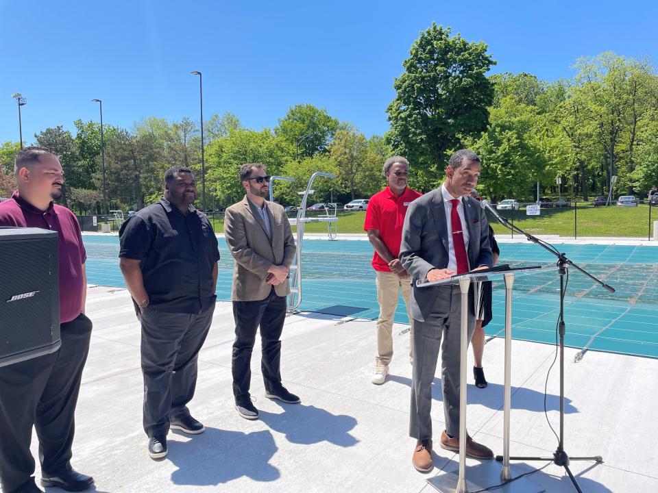 Rochester Mayor Malik Evans speaks at the Genesee Valley Park pool about a pay raise for lifeguards. Behind him, from left, are City Council President Miguel Melendez; Council members Willie Lightfoot Jr. and Mitch Gruber; Director of Community Athletics Eric Rose; and Commissioner of Recreation and Human Services Shirley Green.