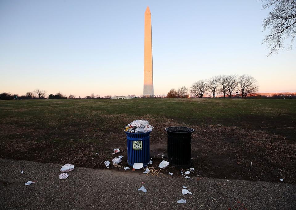 Trash builds up along the National Mall as trash collectors are off work during a partial shutdown of the federal government, on December 23, 2018 in Washington, DC. Mayor Muriel Bowser said the City will help with trash pickup while the National Park Service is closed.