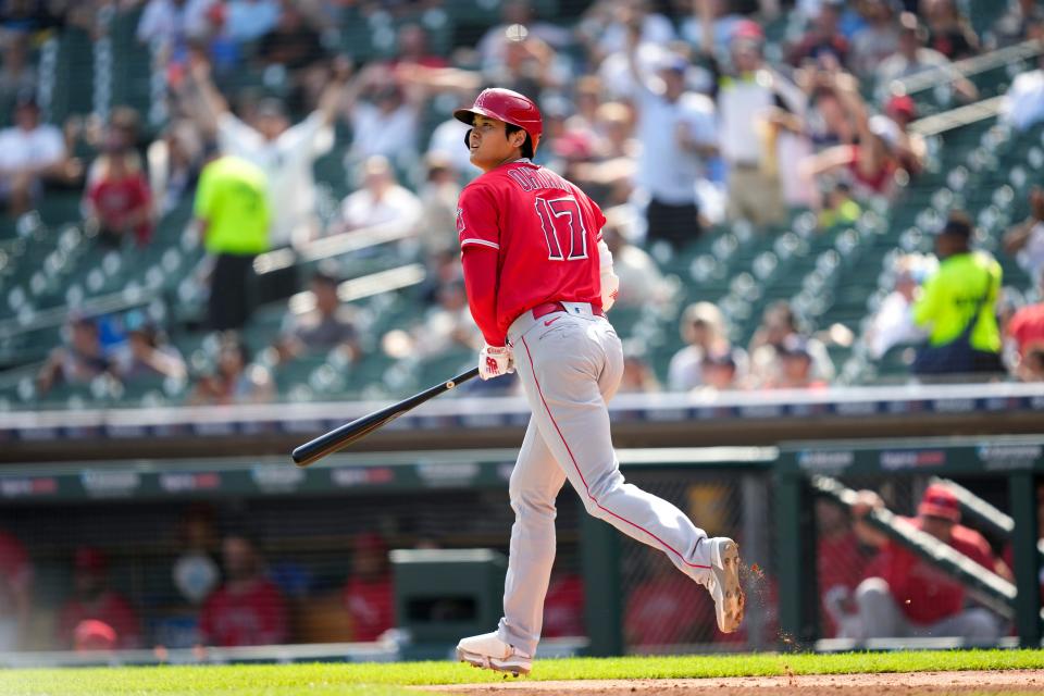 Angels designated hitter Shohei Ohtani watches his two-run home run against the Tigers in the second inning of Game 2 of a doubleheader on Thursday, July 27, 2023, at Comerica Park.