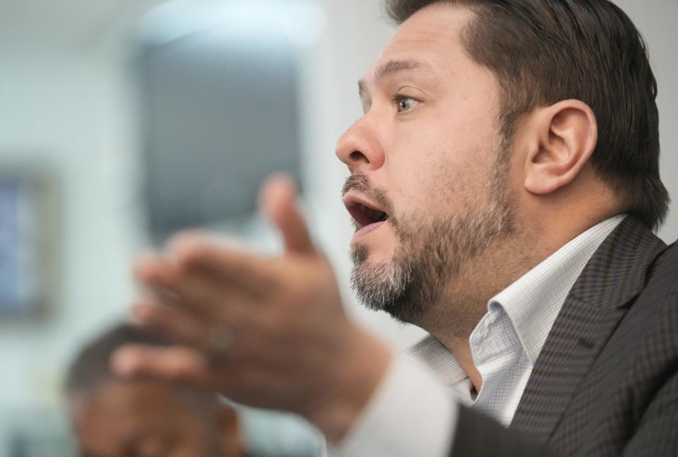 Senate candidate Ruben Gallego speaks during a roundtable with Black business leaders at Natural Impressions Barber Shop in Phoenix on Feb. 12, 2024.