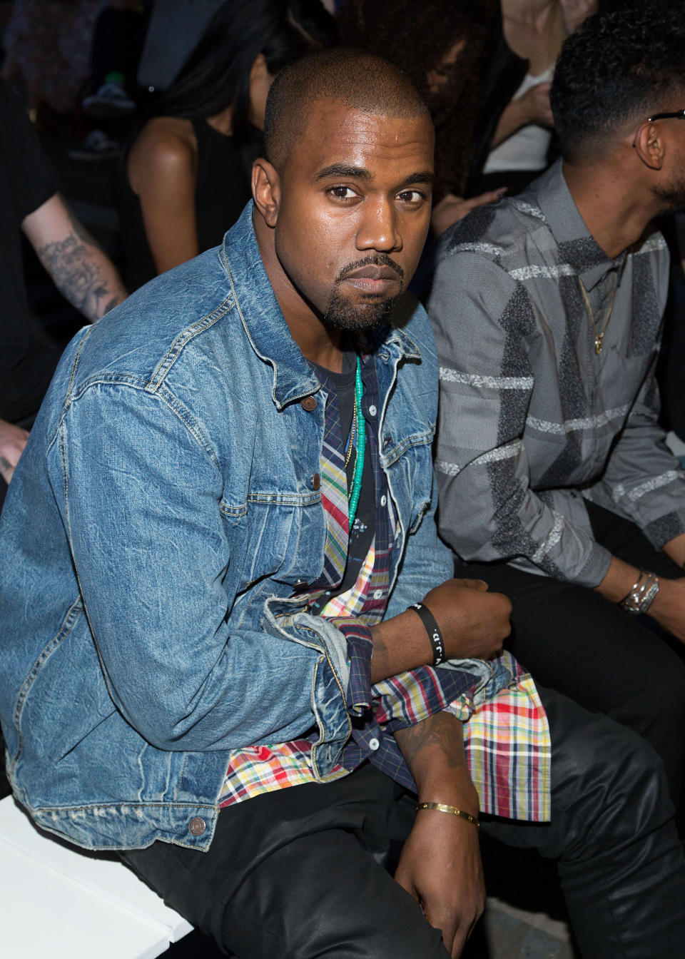 Kanye West attends the Alexander Wang collection on Saturday, Sept. 7, 2012, during Mercedes-Benz Fashion Week in New York. (Photo by Dario Cantatore/Invision/AP)