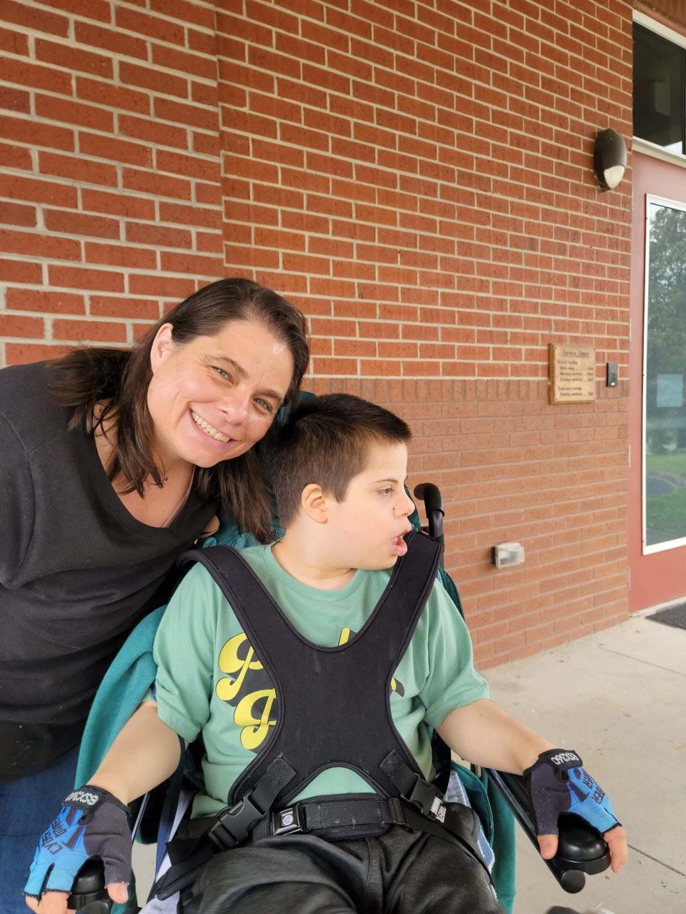 Volunteer Jill Shepherd with camper Cobi Carmichael take a pause for the camera at Forever His Bible Day Camp held at Karns Church of Christ Saturday, April 15, 2023.