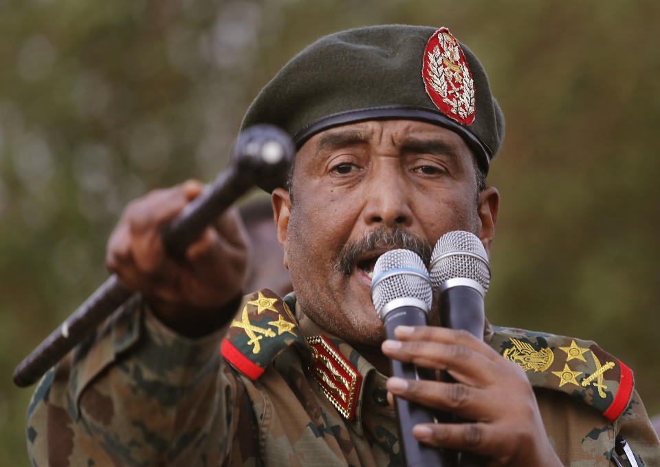 FILE - In this June 29, 2019 file photo, Sudanese Gen. Abdel-Fattah Burhan, head of the military council, speaks during a military-backed rally, in Omdurman district, west of Khartoum, Sudan. Officials in Sudan confirmed that a senior U.S.-Israeli delegation flew to Sudan on a private jet Wednesday, Oct. 21, 2020, and met with Burhan and others to wrap up a deal that would make Sudan the third Arab country to normalize ties with Israel this year. (AP Photo/Hussein Malla, File)