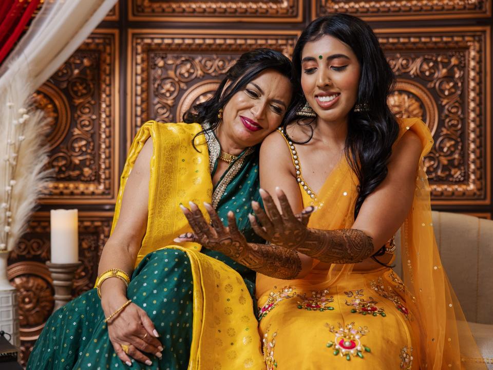 Ashley Balley and her mother at her mehndi