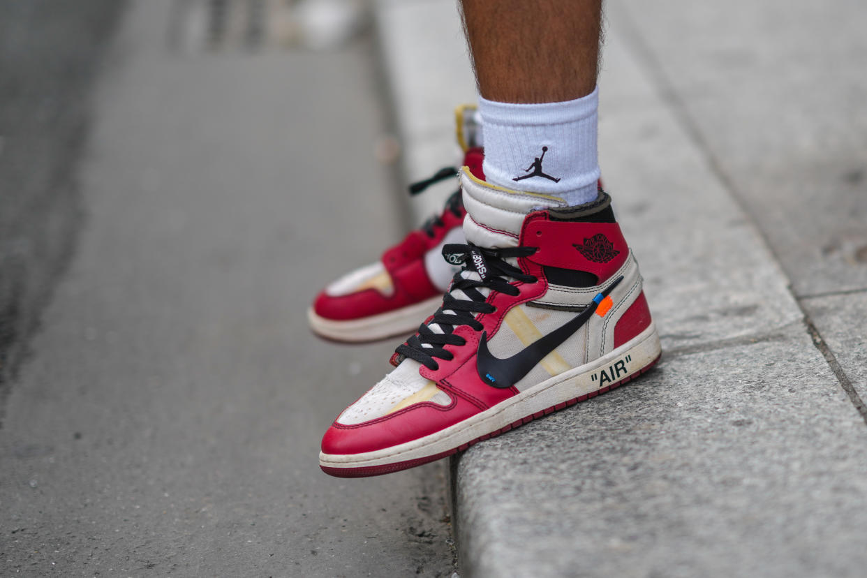 PARIS, FRANCE - JUNE 23: Marc Forne wears white ribbed Air Jordan socks from Nike, black / white and red leather Air Jordan sneakers from Nike, outside BLUEMARBLE, during Paris Fashion Week - Menswear Spring/Summer 2022, on June 23, 2021 in Paris, France. (Photo by Edward Berthelot/Getty Images)