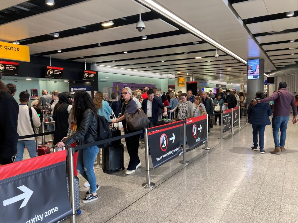 Passengers queue for flights at Heathrow Airport. Would-be travellers have labelled queues at Heathrow 