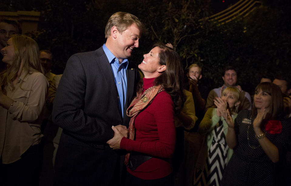 Sen. Dean Heller, left, shares a moment with his wife, Lynne, after speaking to the media about his win over challenger Rep. Shelley Berkley, in Las Vegas, Nov. 7, 2012. (Photo: Julie Jacobson/AP)