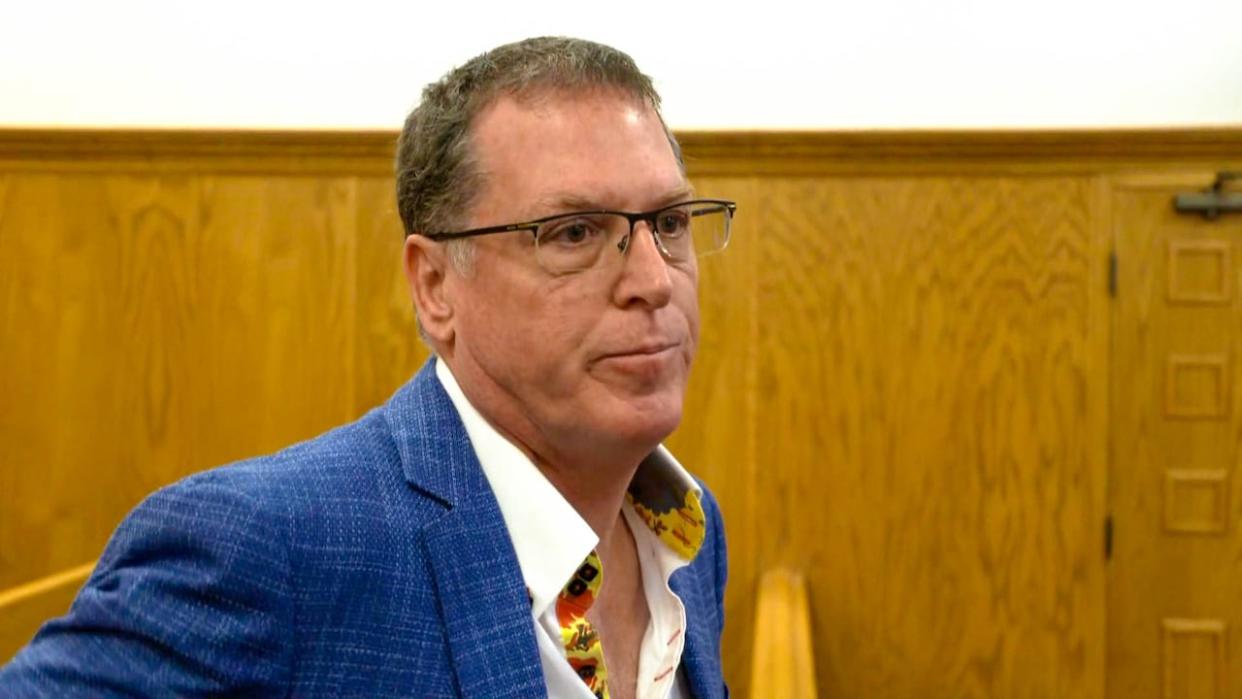 Oral surgeon, Dr. Louis Bourget, has received an absolute discharge after he guided a correctional officer through the removal of a sedated inmate's teeth. (Mark Cumby/CBC - image credit)