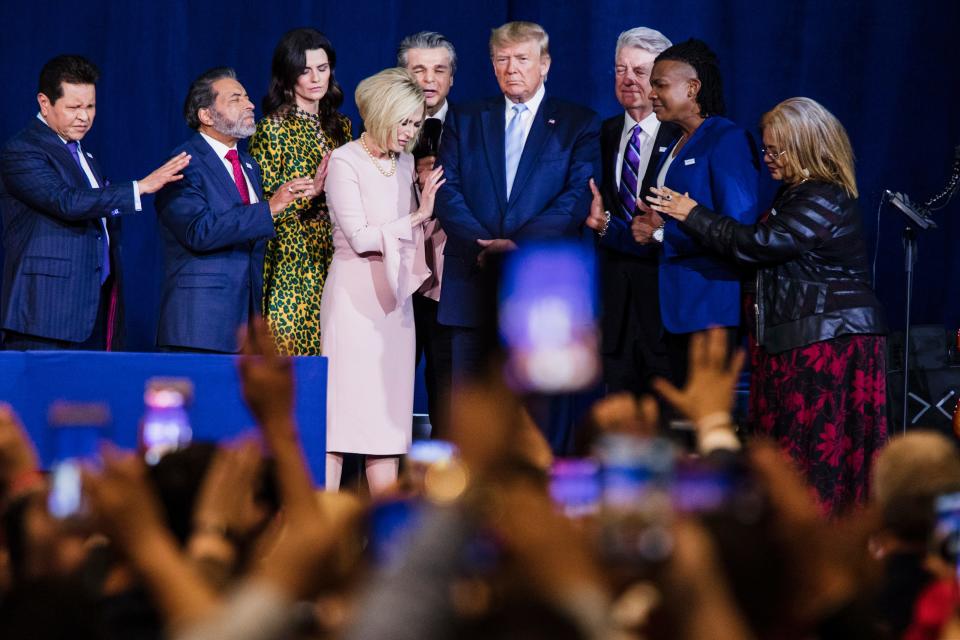 trump on stage with religious leaders