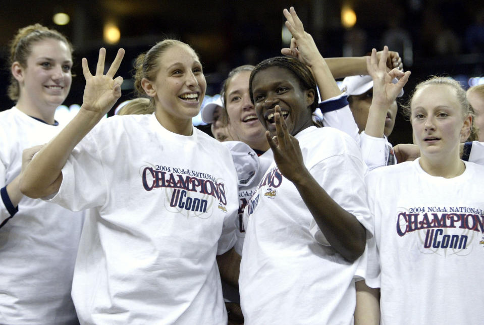 NEW ORLEANS - APRIL 6: Diana Taurasi #3 of the University of Connecticut Huskies and teammate Barbara Turner #33 celebrate after defeating theTennessee Lady Vols 70-61 in the National Championship game of the NCAA Women's Final Four Tournament at the New Orleans Arena on April 6, 2004 in New Orleans, Louisiana. (Photo by Elsa/Getty Images)