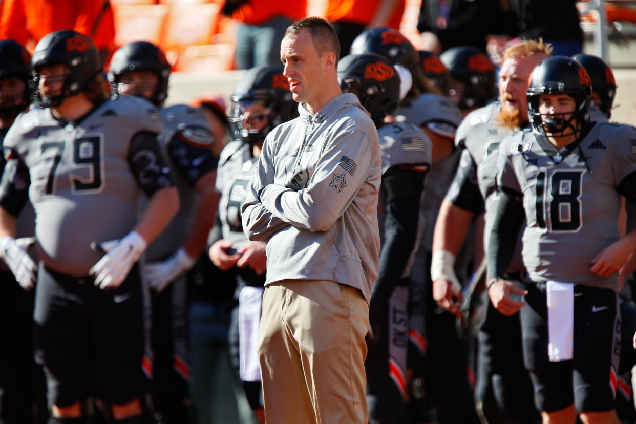 Offensive coordinator Sean Gleeson of the Oklahoma State Cowboys watches his team before a game against the Kansas Jayhawks on Nov. 16, 2019. (Brian Bahr/Getty Images)