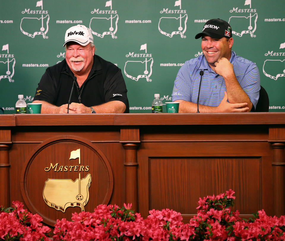 Masters champion Craig Stadler, left, and his son, Kevin Stadler, who is playing in his first Masters, share a laugh while holding a joint father-son press conference at Augusta National Golf Club in Augusta, Ga., Monday, April 7, 2014. (AP Photo/Atlanta Journal-Constitution, Curtis Compton) MARIETTA DAILY OUT; GWINNETT DAILY POST OUT; LOCAL TV OUT; WXIA-TV OUT; WGCL-TV OUT