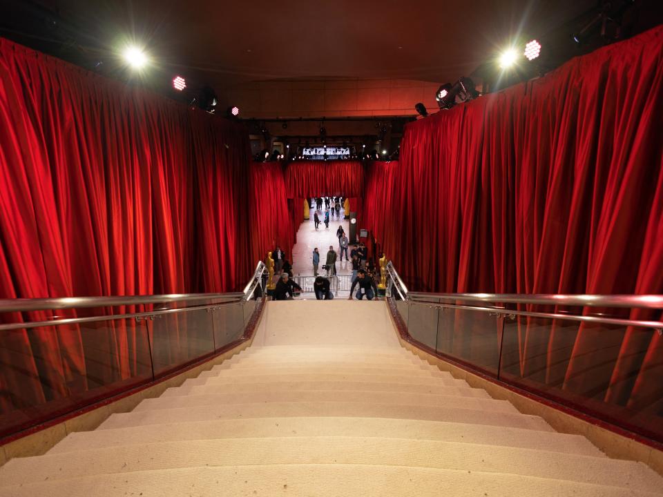 A champagne colored carpeted stairway leads guests into the Dolby Theatre as preparations continue for the 95th Academy Awards, also knows as the Oscars, in Los Angeles, California, U.S. March 11, 2023.