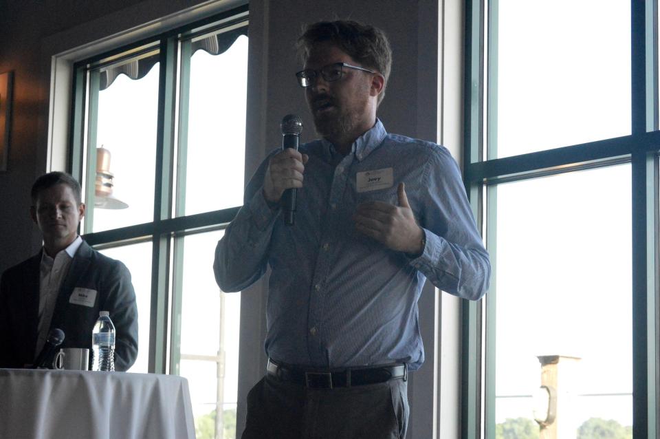 Joey Andrews, Democratic candidate for Michigan House District 38, speaks to attendees at the West Coast Chamber of Commerce candidate forum at Boatwerks Restaurant on Monday, June 20, 2022.