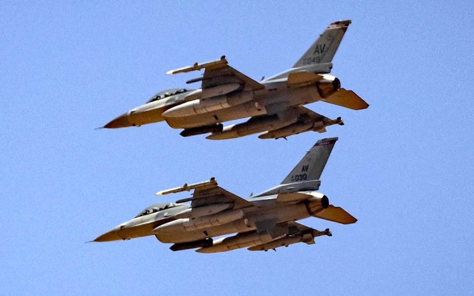 (FILES) In this file photo taken on June 14, 2021 US Air Force F-16 fighter jets prepare to land at an airbase in Ben Guerir, about 58 kilometres north of Marrakesh, during the "African Lion" military exercise. President Joe Biden said on January 31, 2023 he will not be sending F-16 fighter jets to Ukraine to help its war against Russian invaders, but said he would visit crucial ally Poland. (Photo by FADEL SENNA / AFP) (Photo by FADEL SENNA/AFP via Getty Images) - FADEL SENNA / AFP