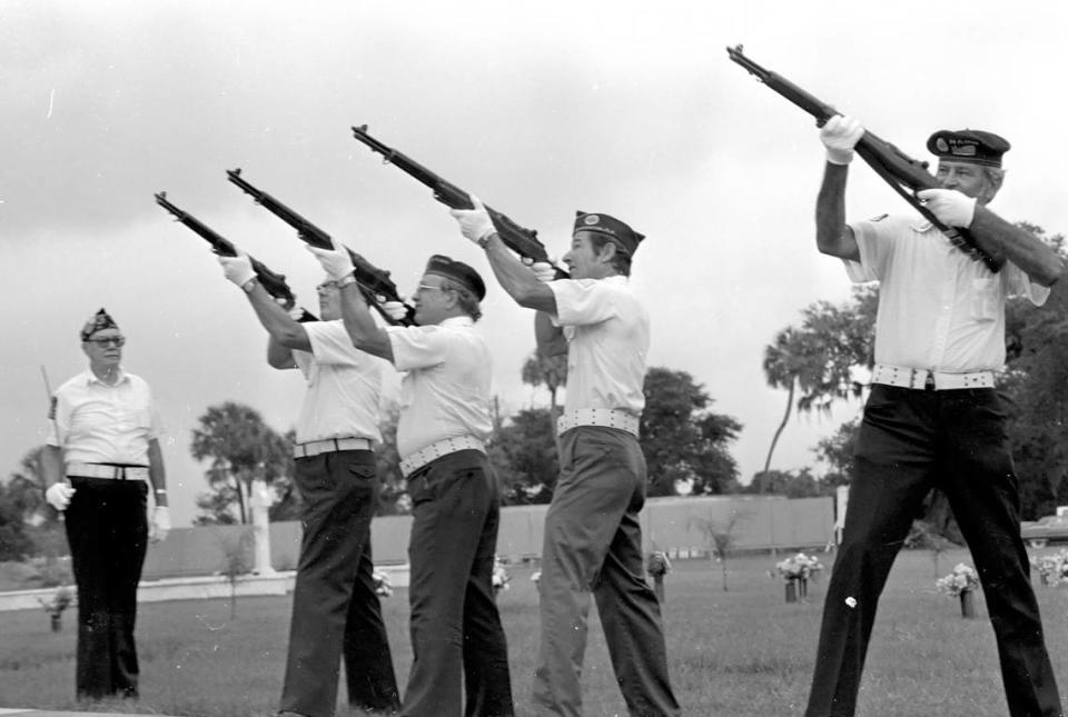 An Honor Guard readies their rifles during Memorial Day ceremonies at Manatee County cemeteries in 1980.