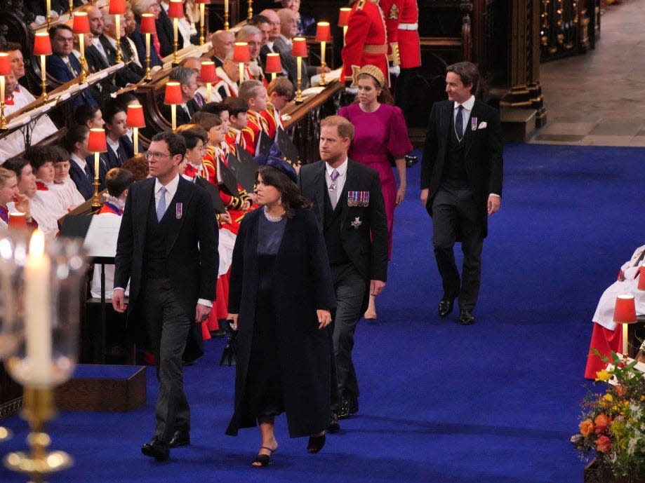 Princess Eugenie and Jack Brooksbank (front), Harry, Duke of Sussex (C) and Princess Beatrice and Edoardo Mapelli Mozzi arrive to attend the Coronation of King Charles III and Queen Camilla on May 6, 2023 in London, England.