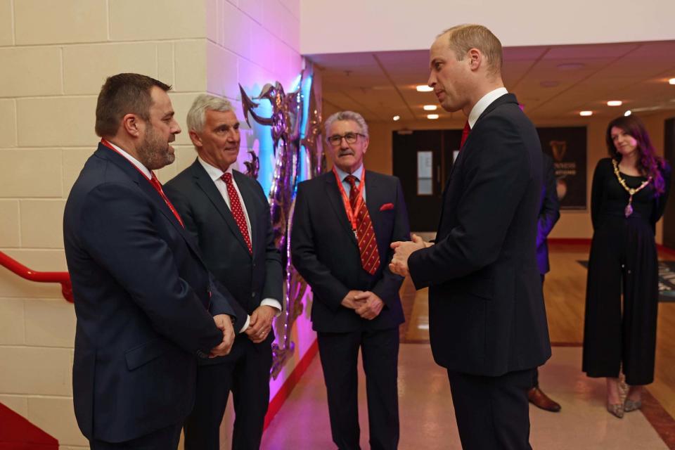 Duke of Cambridge greets Welsh Rugby Union (WRU) Chairman Gareth Davies (second left) and Chief Executive Martyn Phillips (left) (Getty Images)