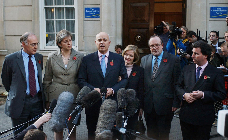 Iain Duncan Smith talks to journalists, with his wife, Betsy, at his side, outside the Conservative Central Office in London after 25 MPs wrote to Sir Michael Spicer, chair of the 1922 Committee of backbenchers, demanding a vote of confidence in him as leader.  Mr Duncan Smith told journalists he welcomed the opportunity to win a 'renewed mandate' to lead the party to the next election.   11/11/03: The Conservatives announced they are to sell off their historic headquarters to raise desperately needed party funds.  New leader Michael Howard hopes to raise around  6 million from moving out of the Central Office the party has operated for 45 years.