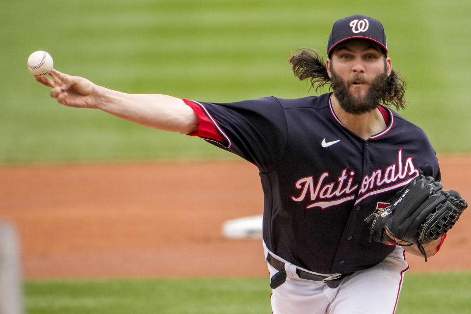 Washington Nationals starting pitcher Trevor Williams throws during the first inning of a baseball game against the Los Angeles Dodgers at Nationals Park, Sunday, Sept. 10, 2023, in Washington. (AP Photo/Andrew Harnik)