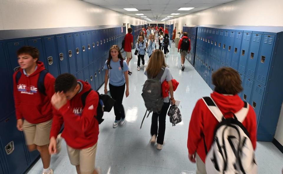 Charlotte Catholic High School students change classes on Wednesday, August 16, 2023.