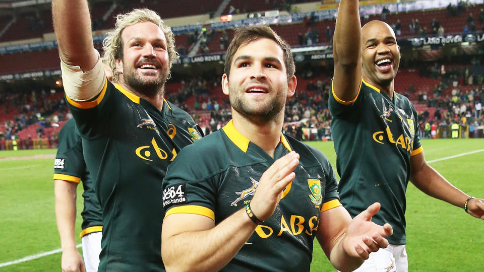 Jannie du Plessis, pictured here with teammates after a Springboks victory over the Wallabies in 2014.