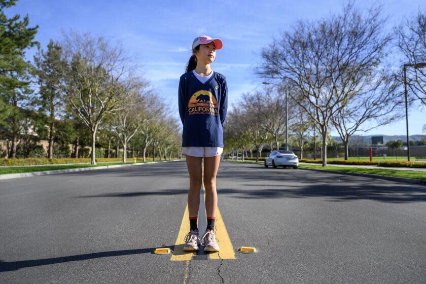 IRVINE, CA - MARCH 10, 2024: Evan Kim, 12, ran a 2:58 in the Ventura marathon recently, making her the fastest girl or woman age 1-19 and the second fastest overall on March 10, 2024 in Irvine, California. (Gina Ferazzi / Los Angeles Times)