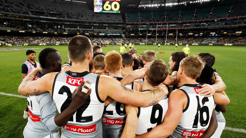 Port Adelaide players, pictured here before their clash against Richmond at the MCG.