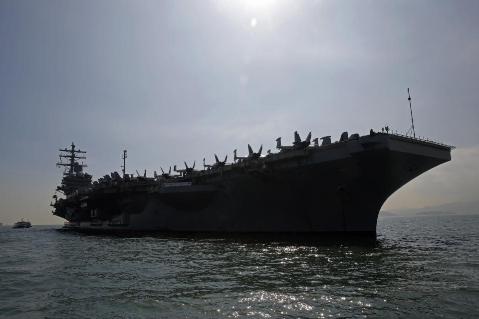 The U.S. Navy's USS Ronald Reagan aircraft carrier is anchored In Hong Kong, Wednesday, Nov. 21, 2018. The USS Reagan docked in Hong Kong on Wednesday, days after a pair of American B-52 bombers flew over the disputed South China Sea. (AP Photo/Kin Cheung)