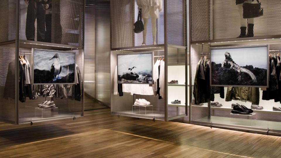 PHOTO: Images that former fashion photographer Enzo Barracco took in Antarctica and the Galapagos Island are displayed among the merchandise at Prada's New York flagship in Manhattan's Soho neighborhood. (ABC News)