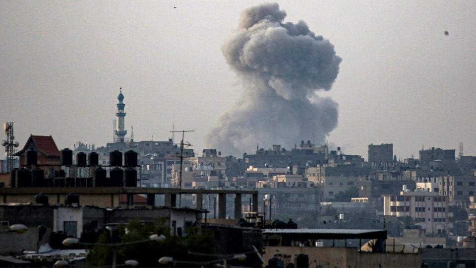 Smoke clouds rise during Israeli bombardment east of Rafah in the southern Gaza Strip on May 19, as conflict between Israel and the Palestinian militant group Hamas continues.