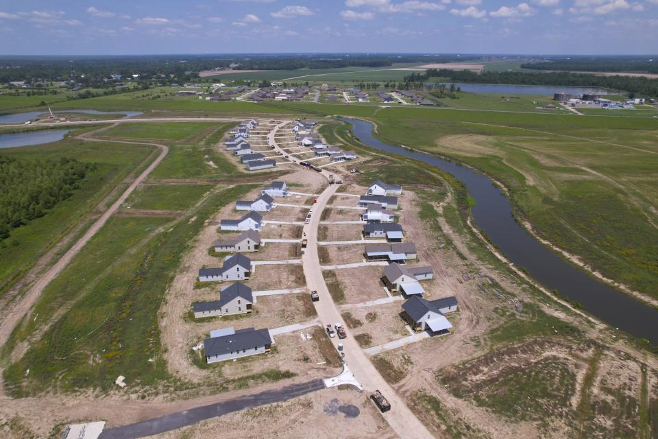 An aerial view of newly built homes in a subdivision.