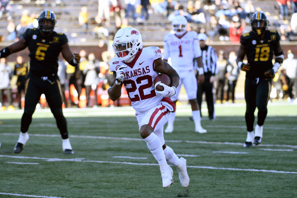 Arkansas running back Trelon Smith scores on a touchdown run during the second half of an NCAA college football game against Missouri Saturday, Dec. 5, 2020, in Columbia, Mo. (AP Photo/L.G. Patterson)