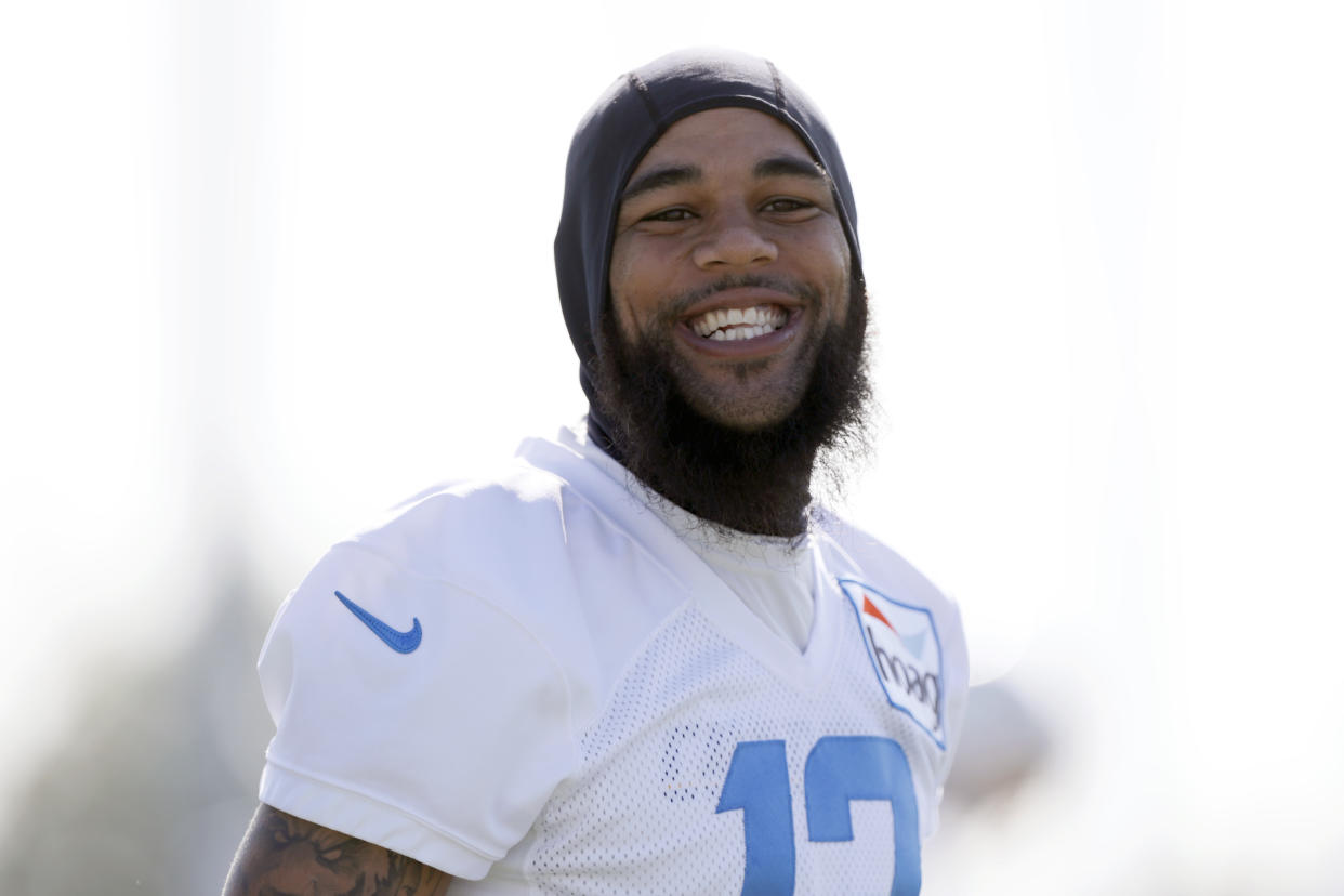 There's a lot besides football that makes Keenan Allen smile. (AP Photo/Alex Gallardo)