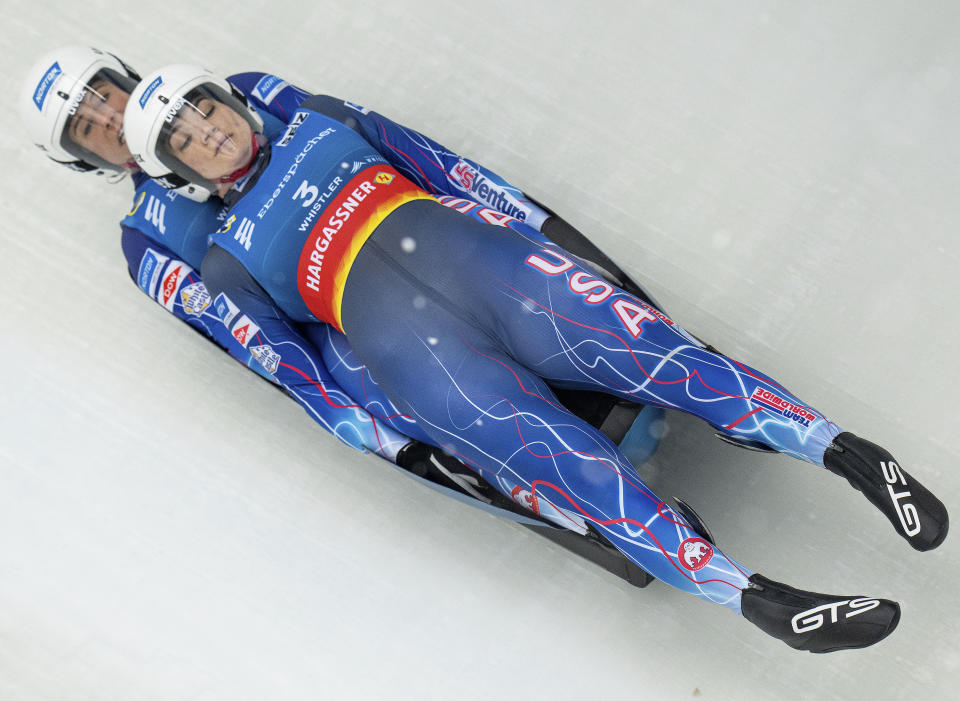 Summer Britcher and Emily Sweeney of the United States during the luge World Cup in Whistler, British Columbia, Saturday, Dec. 10, 2022. (Jonathan Hayward/The Canadian Press via AP)