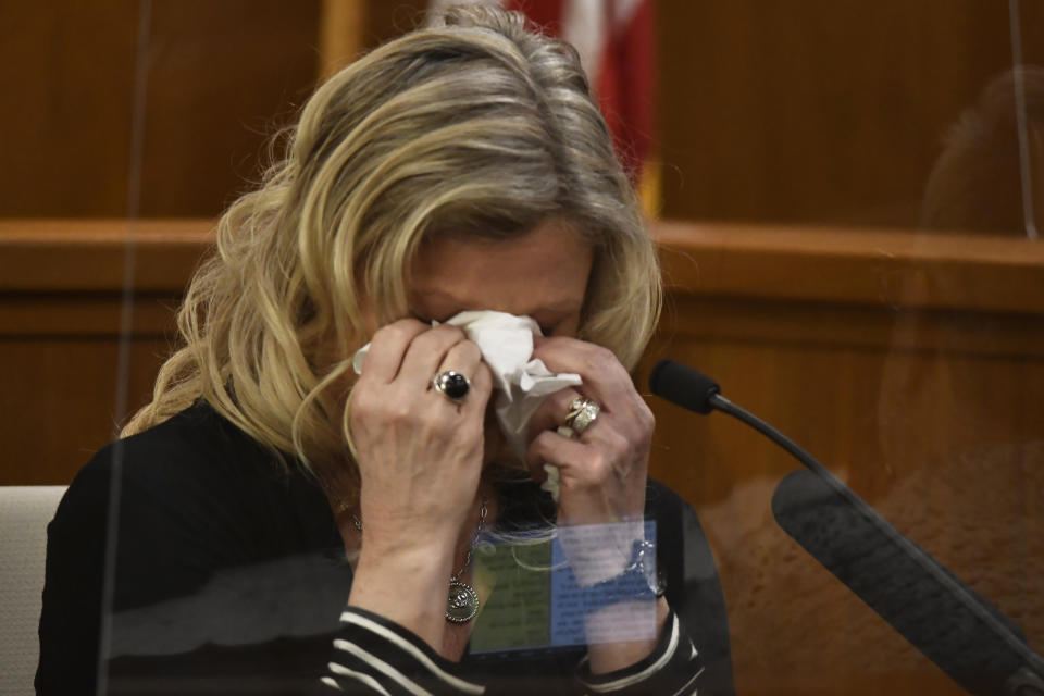 Ruth Vorwald gets emotional as she describes the scene where the late Julie Jensen was found dead while testifying in Mark Jensen's trial at the Kenosha County Courthouse on Wednesday, Jan. 11, 2023, in Kenosha, Wis. The Wisconsin Supreme Court ruled in 2021 that Jensen deserved a new trial in the 1998 death of his wife Julie Jensen, who was poisoned with antifreeze. (Sean Krajacic/The Kenosha News via AP, Pool)