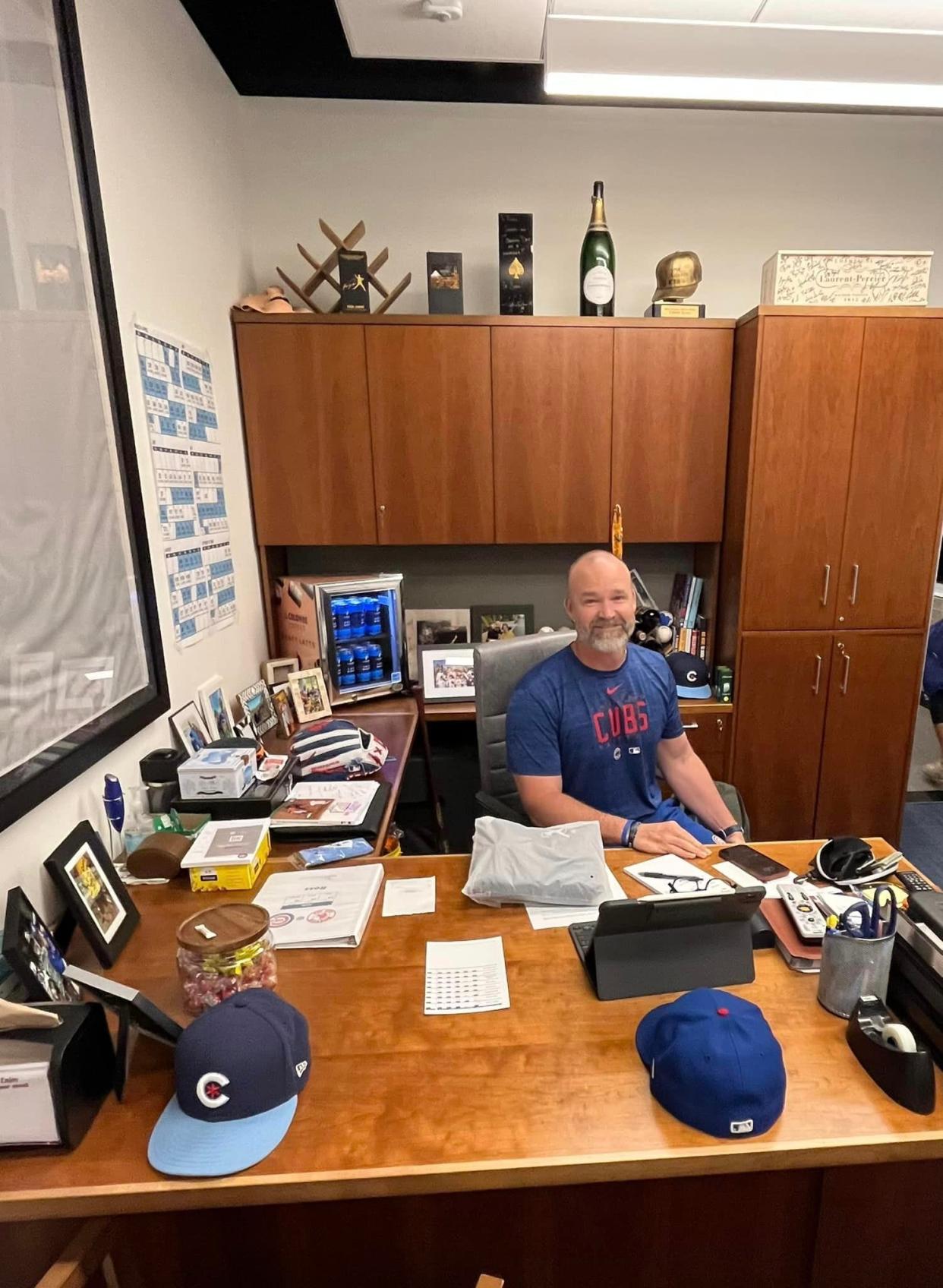 Chicago Cubs manager and Tallahassee resident David Ross sits behind his desk at Wrigley Field before a recent game against the Boston Red Sox.