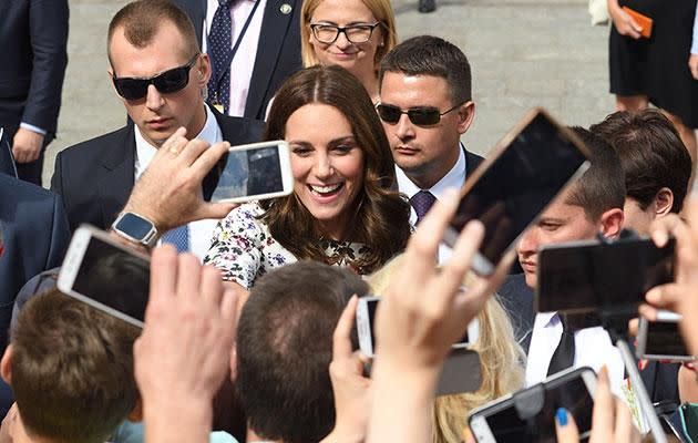 Kate and Wills were mobbed by thousands of well wishers. Photo: Getty