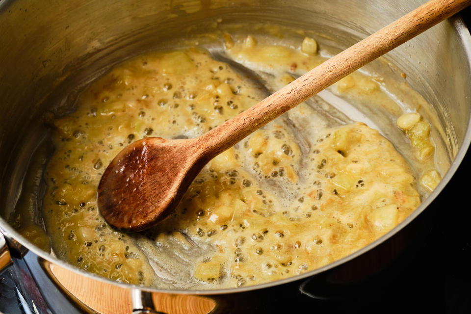 Cooking roux - butter and floor - in a pot.