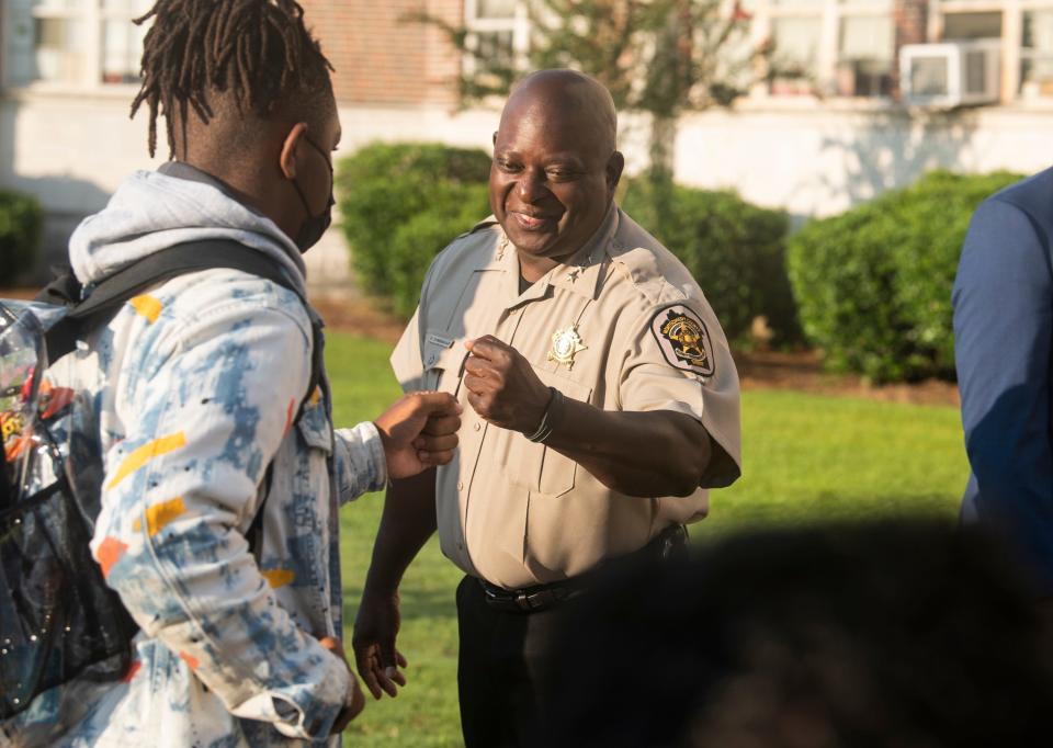 Montgomery County Sheriff Derrick Cunningham welcomes students at Lanier High School in Montgomery, Ala., on Wednesday, Sept. 14, 2022.