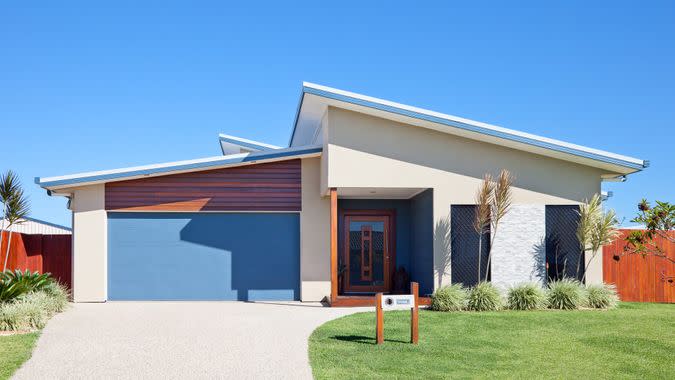 Modern Family Home Front with blue sky